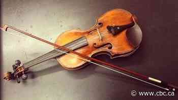 Have you seen this violin? It was in a bright red case when it went missing on the subway