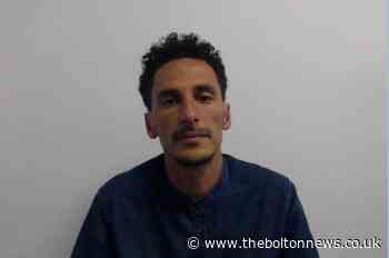 Police searching for Hicham Mihoub in connection with domestic violence and stalking offences committed in Wigan