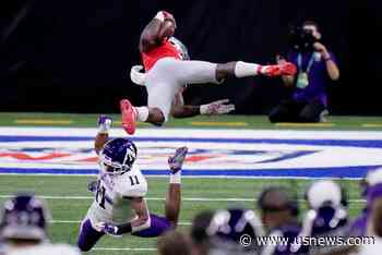No. 3 Ohio St. Runs Past No. 15 Wildcats for Big Ten Crown