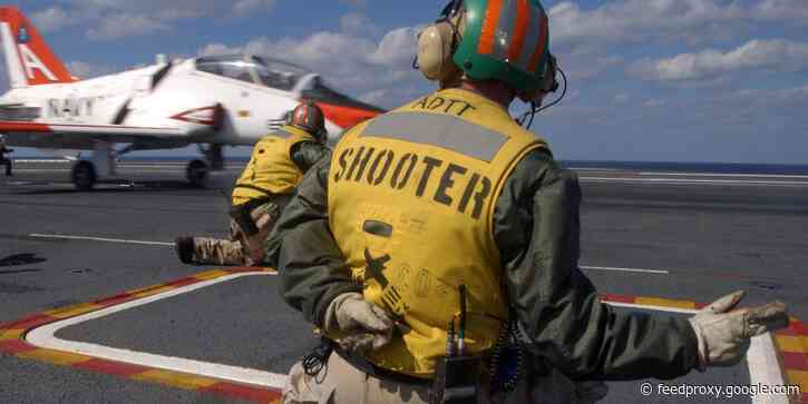 Why the Navy's 'shooters' get to launch their boots off of aircraft carriers