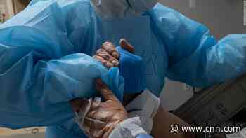 US Covid cases and deaths spike heading into Christmas week