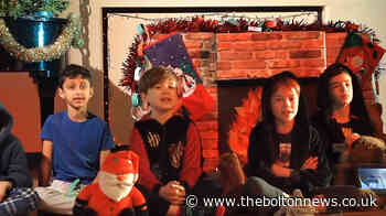 Bolton School junior boys and girls  continue the tradition of staging festive performances in a covid-secure way