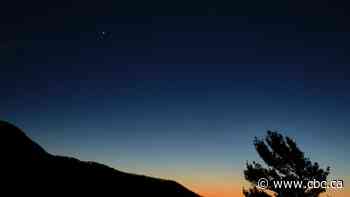 Stargazers watch for conjunction of Jupiter and Saturn as brighter 'Christmas star'