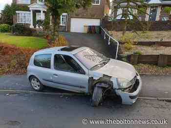 Smashed car found obstructing residential street in Bolton - The Bolton News
