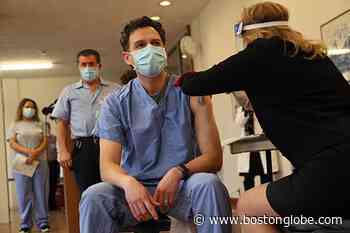 Doctor receives first dose of COVID-19 vaccine at Rhode Island Hospital - The Boston Globe