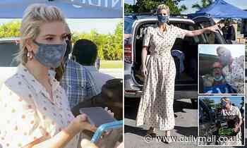 Ivanka Trump gives food to Miami families as Donald calls volunteers - Daily Mail