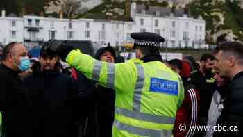 Truckers scuffle with police in U.K. as they wait to enter France