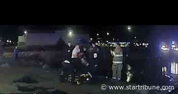 Coon Rapids police pull unconscious driver from sunroof of submerged vehicle in rescue caught on squad video