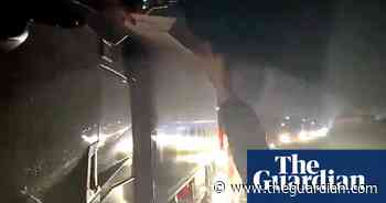 Kent volunteers make pizzas and hot meals for stranded lorry drivers – video