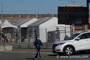 California Sees Near-Record Deaths, Modest Signs of Hope