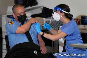 After Months on Front Lines, New York EMTs Receive Vaccines