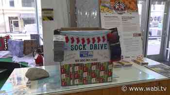 Belfast shoe store collects thousands of socks for United Way of Eastern Maine - WABI