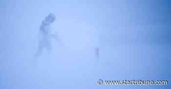 Christmas blizzard pummels Minnesota, closing roads, stranding drivers