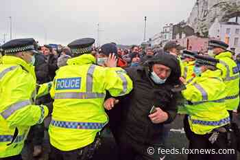 Amid fear over new coronavirus strain, France lets in some UK cargo, passengers