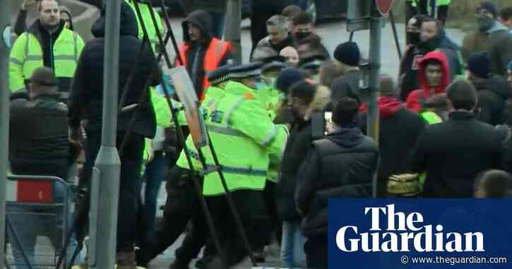 Lorry drivers clash with police as tensions boil over in Dover – video