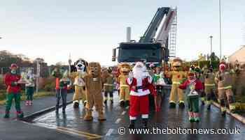 Firefighters give Santa Claus a lift this Christmas eve - The Bolton News
