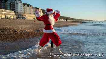 In Pictures: Care home visits, sledging and chilly swims mark Christmas Day