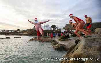 In Pictures: Care home visits, sledging and chilly swims mark Christmas Day