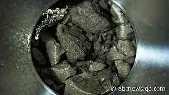 Japanese spacecraft's gifts: Asteroid chips like charcoal