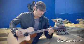 Baby Yoda rocks out with director Robert Rodriguez on The Mandalorian set     - CNET