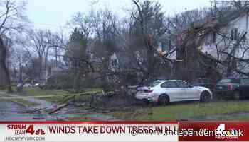 Nearly 500,000 wake up with no power after Christmas Eve storm batters east coast