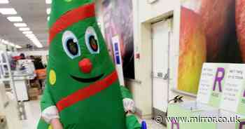 Hilarious moment woman dressed as inflatable Christmas tree bops about during food shop - Mirror Online