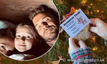 Harper Beckham, 9, delightedly prepares to scatter a packet of 'reindeer food' ahead of the big day - Daily Mail