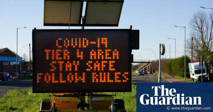 Millions wake up to tougher restrictions as UK Covid deaths pass 70,000