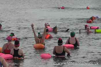 Sea swimmers take to the water on Christmas Day - St Helens Star