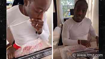 Ace Hood's Wife Gifted Him Custom Plaques to Celebrate Independent Success
