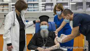 Elderly and healthcare workers get first coronavirus jabs in show of EU unity