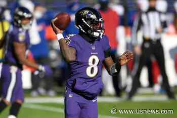 Torrid Ravens Get Jump on Giants, Roll to Easy 27-13 Victory