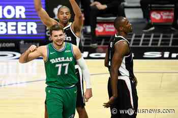 Mavs Destroy Clippers 124-73 to Earn 1st Win of Season