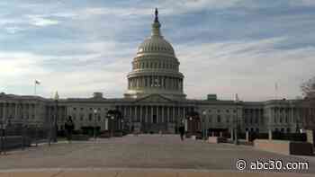 AP source: Trump signs pandemic relief and government-funding measure, averting shutdown