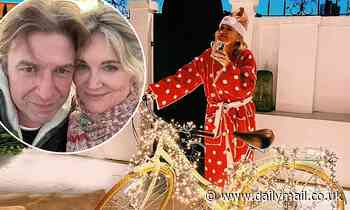 Anthea Turner celebrates getting a new bike for Christmas and cosies up ...