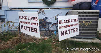 Toronto neighbourhood springs into action against racists who tore down sign - blogTO