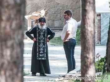 Covid-denying renegade priest detained in police raid on Russian convent