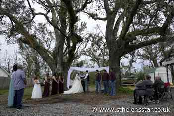 Hurricanes and coronavirus can't stop Louisiana couple's wedding - St Helens Star