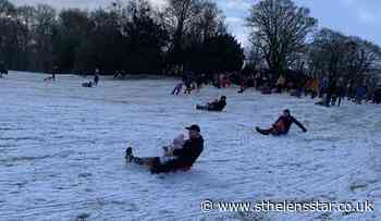 Families flock to parks' 'slopes' for fun in the snow - St Helens Star