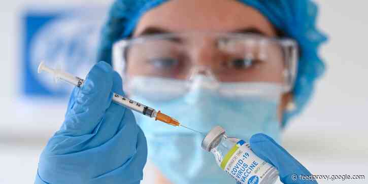 A California woman in her 30s who said she's a Disney employee said she got the coronavirus vaccine, while the state is being overwhelmed by a surge in cases