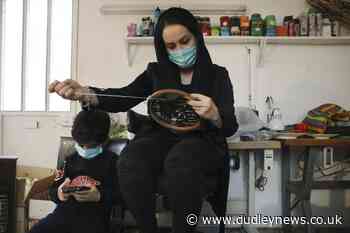 Iranian women's group empowers amid pandemic by making face masks - Dudley News
