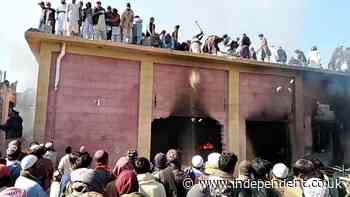 Pakistan arrests 14 after mob led by Islamist clerics sets century-old Hindu temple on fire