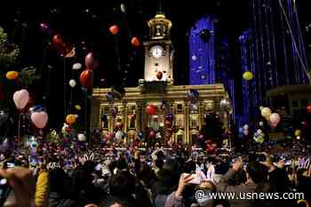 Crowds Fill Streets in China's Pandemic-Hit Wuhan, Celebrate New Year