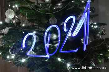 World ushers in New Year in shadow of pandemic