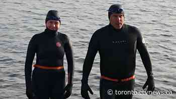 Father, daughter swimming duo take to the lake due to pool closures