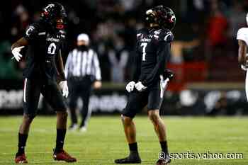 Watch: Cincinnati’s Coby Bryant with the pick and sideline slam in Peach Bowl