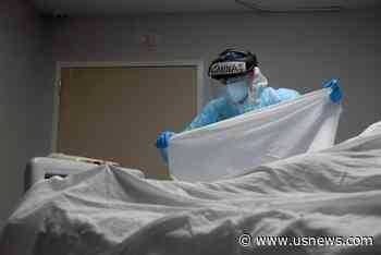 U.S. COVID-19 Cases Surpass 20 Million as Deaths Mount