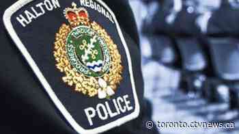 Arrest made after woman found shot in vehicle at Appleby GO station parking lot