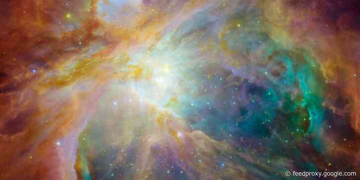 NASA shared some interstellar fireworks to bring 2020 to an end. The Orion Nebula looks like a rainbow canvas peppered with dots of light.