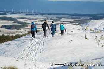 In Pictures: Britons brave the elements to enjoy winter walks - The Bolton News